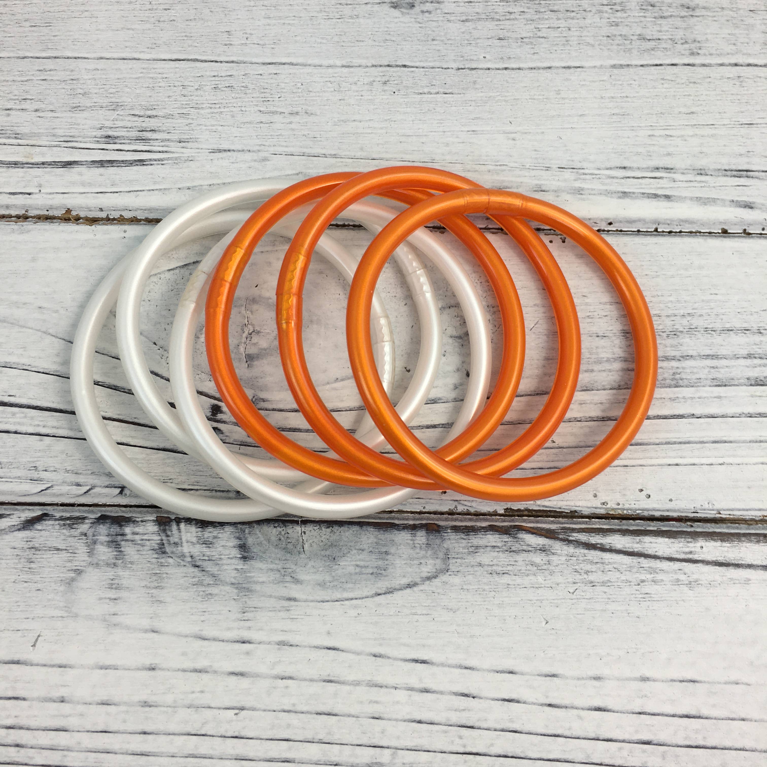 Orange and white bangle bracelet set 